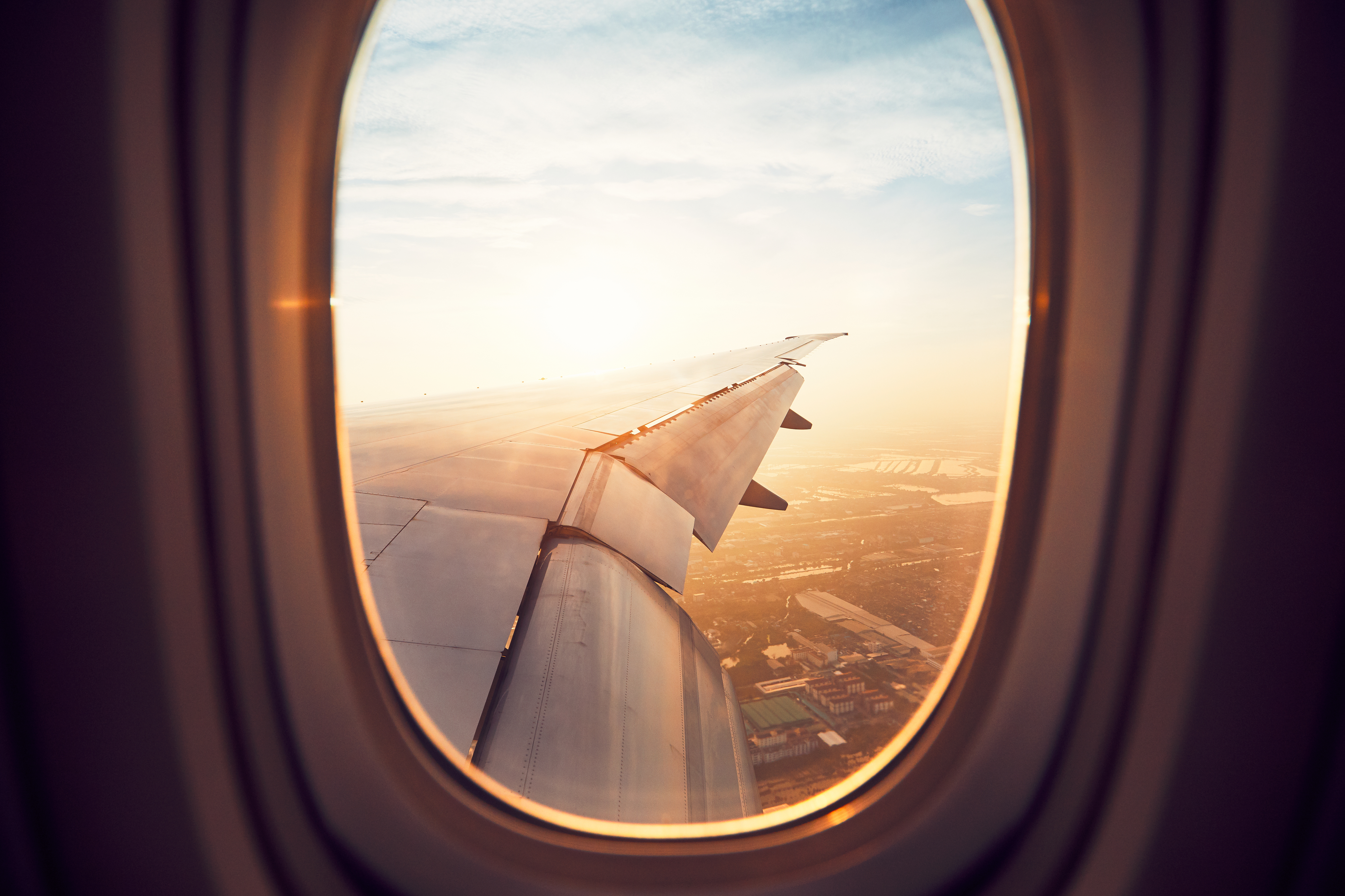 Sunrise over Thailand out of a plane.